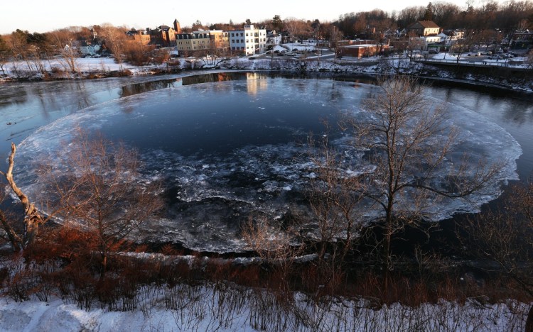 A new Westbrook ice disk is forming in the Presumpscot River below Saccarappa Falls. 