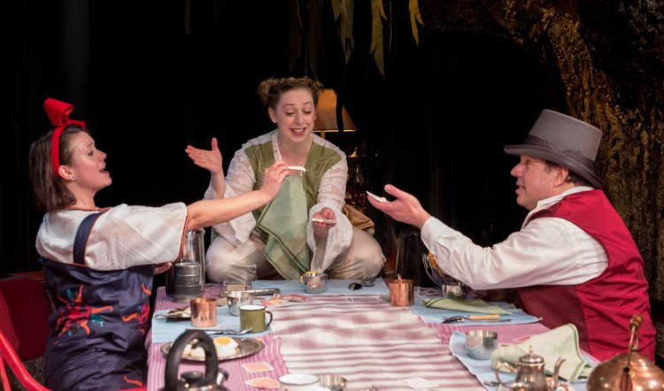 Marie Stewart Harmon, Kat Moraros and Zack Handlen with Tyler Costigan in tree in background in "Waiting for Alice."