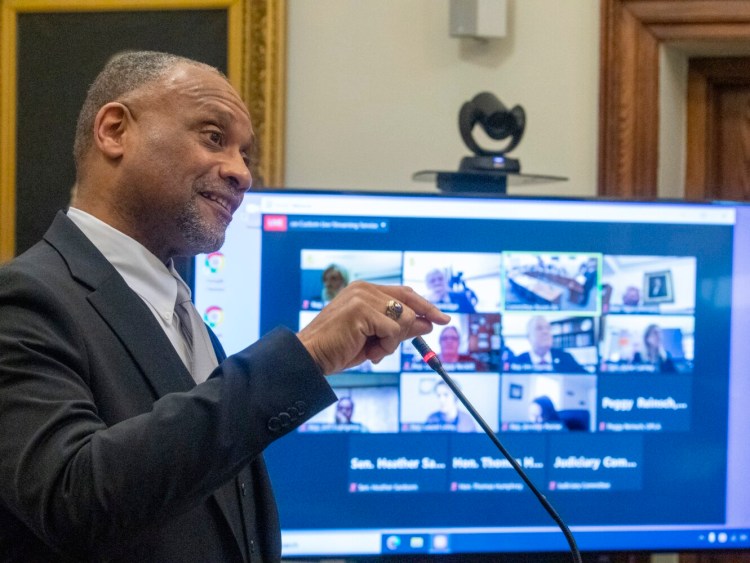 District Court Judge Rick Lawrence speaks Friday before the Judiciary Committee during his confirmation hearing to become an associate justice on the Maine Supreme Judicial Court at the Maine State House in Augusta.