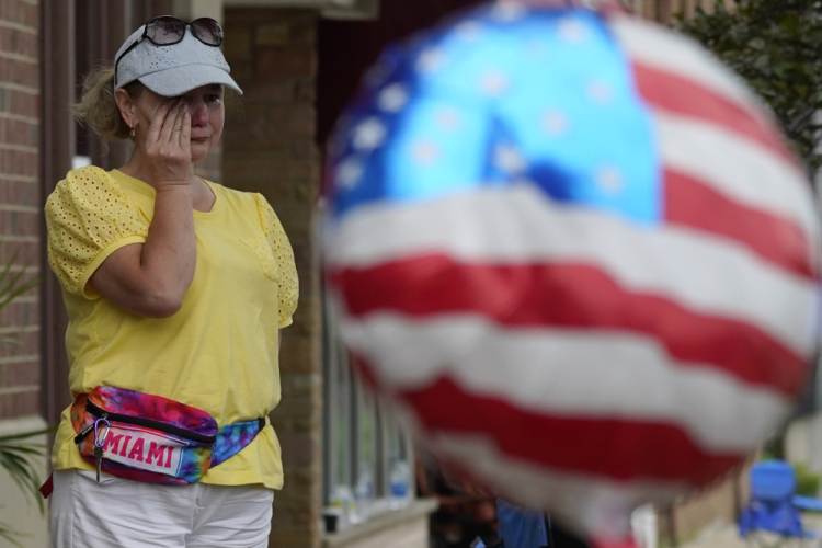 APTOPIX Shooting July Fourth Parade