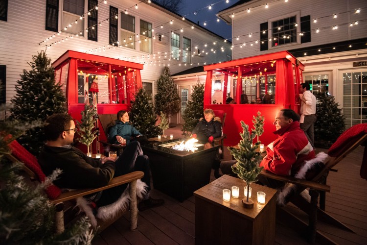 Enclosed "gondolas" are winter outdoor dining options at The Burleigh at The Kennebunkport Inn. 