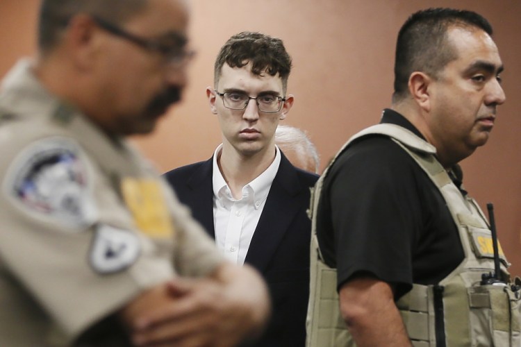 Walmart shooting suspect Patrick Crusius, center, pleads not guilty during his arraignment, Oct. 10, 2019, in El Paso, Texas. 