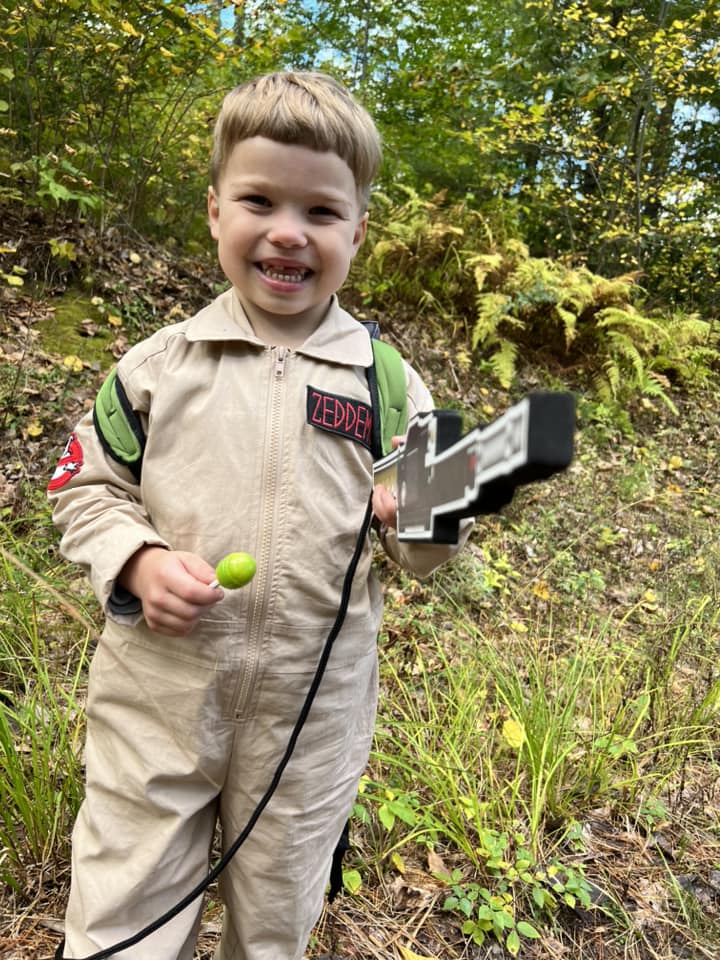 Sullivan Mudie of Augusta was at camp with his mom Lynette Mudie. Sullivan is a Lion Cub in Pack 684 and is in Kindergarten. "I liked seeing the bumblebees," Sullivan said. "And shooting the pumpkins with the BB Gun." The Haunted House beneath the dining hall was guarded by the Grim Reaper (Joseph Maranda) of Augusta and his son Owen Maranda of Augusta and Chelsea. Owen is a Tenderfoot Scout in Troop 631 where his dad is one of the Assistant Scoutmasters. "I'm having fun directing people into the Haunted House," Owen said. Logan Juengst is a Zombie Hunter from Manchester and is a Webelos Cub Scout in Pack 622. He hadn't found any zombies around Camp Bomazeen but found a lot of fun.